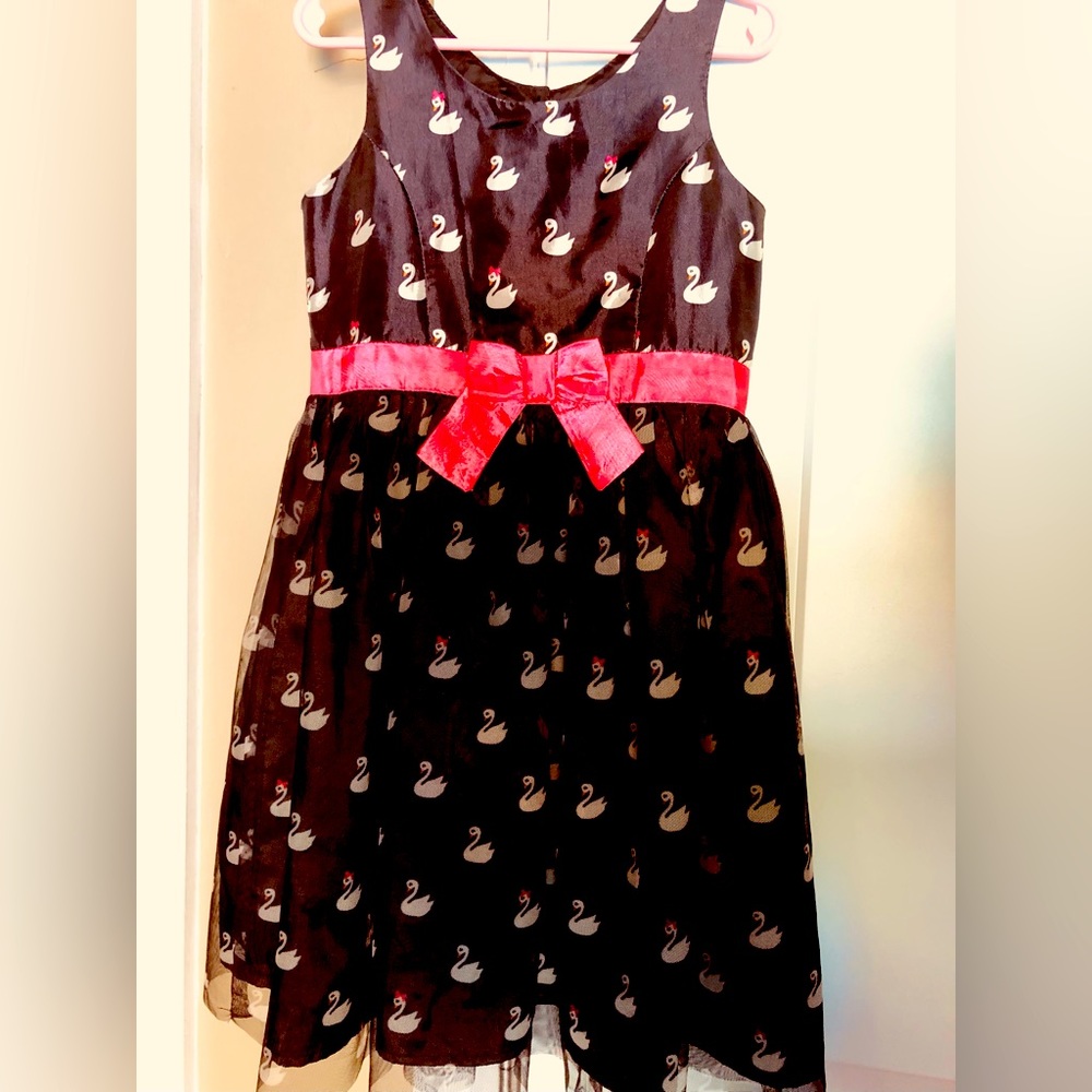 Girls black and silver swan dress size 6/7.